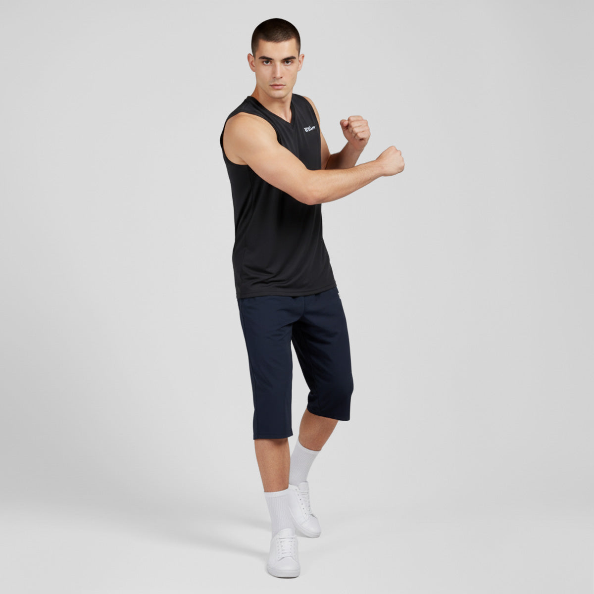 Playera Wilson Ultra Ligera Sin Manga Cuello en V para Hombre - Sports Center